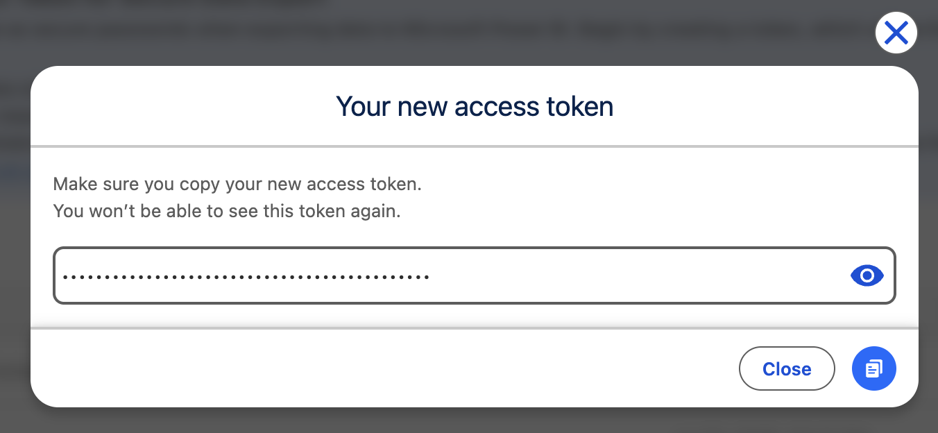 New access token dialog with masked token value and copy button